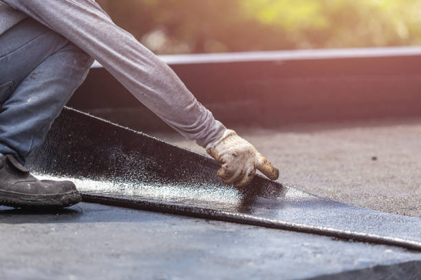 Professional Emergency Waterproofing technician working in Amityville, NY